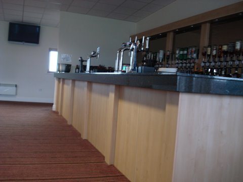 Bespoke bar front in light timber