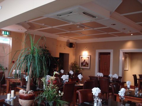 Restaurant dining room with coffered ceiling