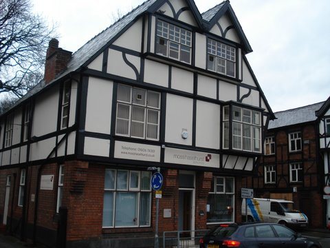 Black and white Tudor style commercial building