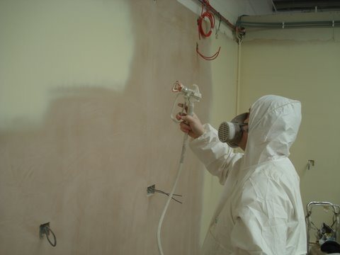 Airless spray application in protective equipment